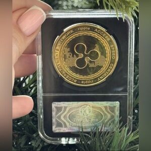 XRP physical coin golden color in protective case, XRP crypto fans